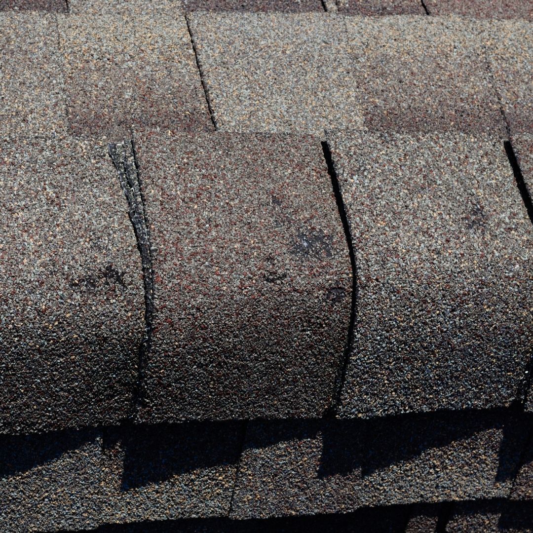 Close up of hail damage marks on a roof